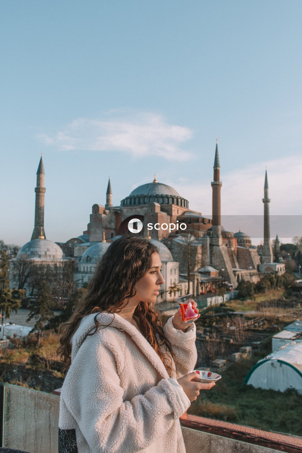 Relaxing Moment on Balcony With View of Majestic Mosque