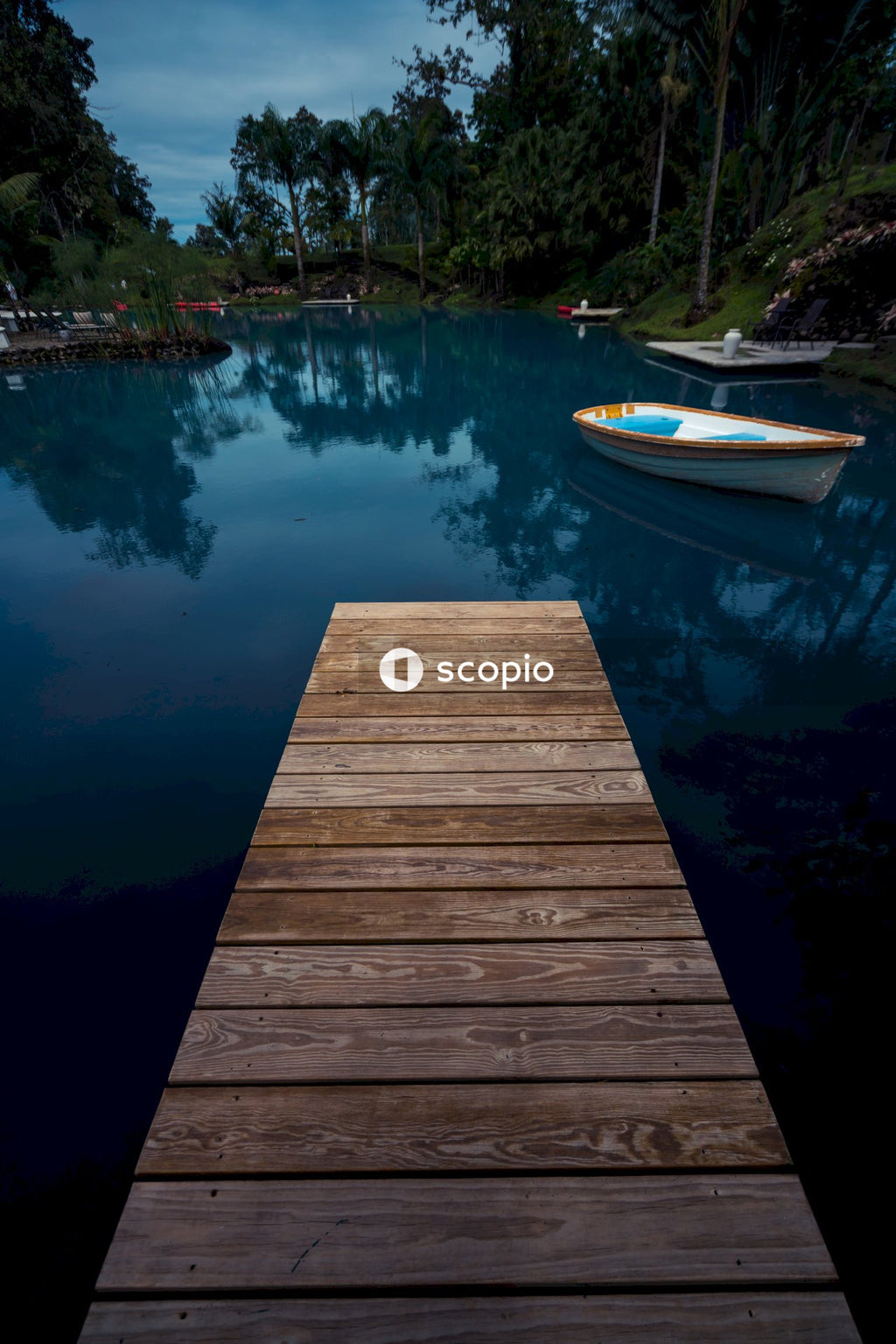 Brown wooden dock on lake