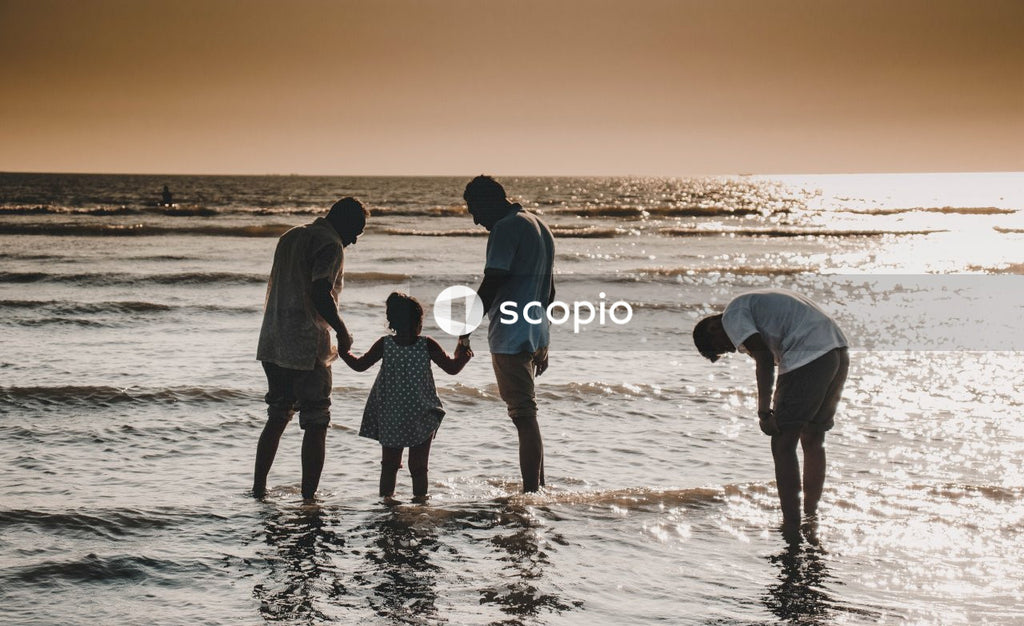 People in water during sunset