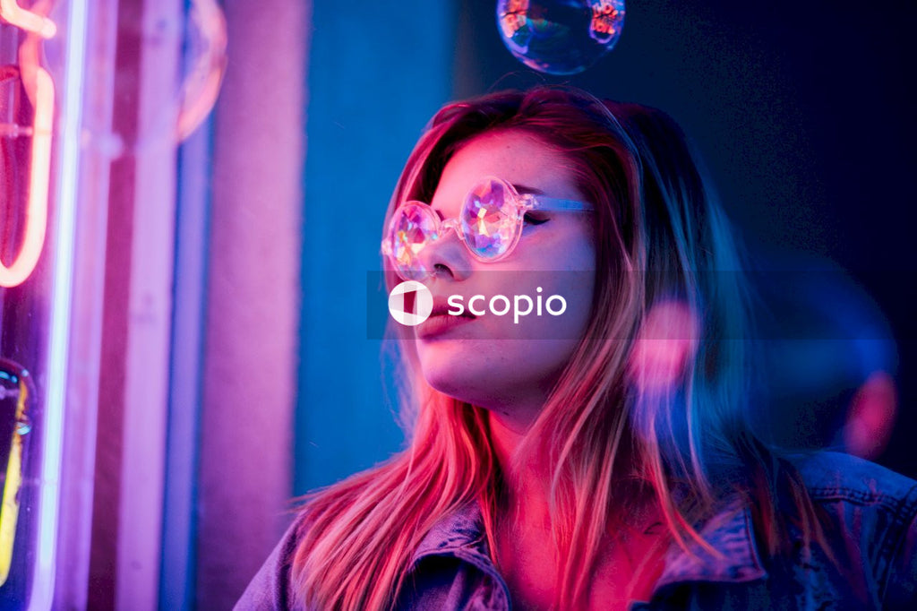Woman in eyeglasses surrounded by soap water