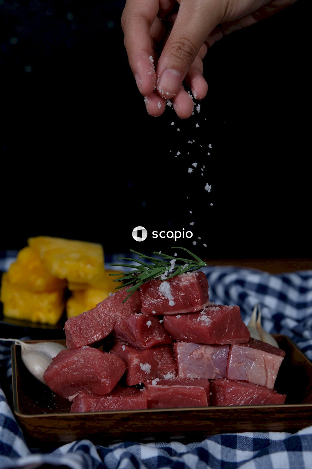 Sliced meat on black table