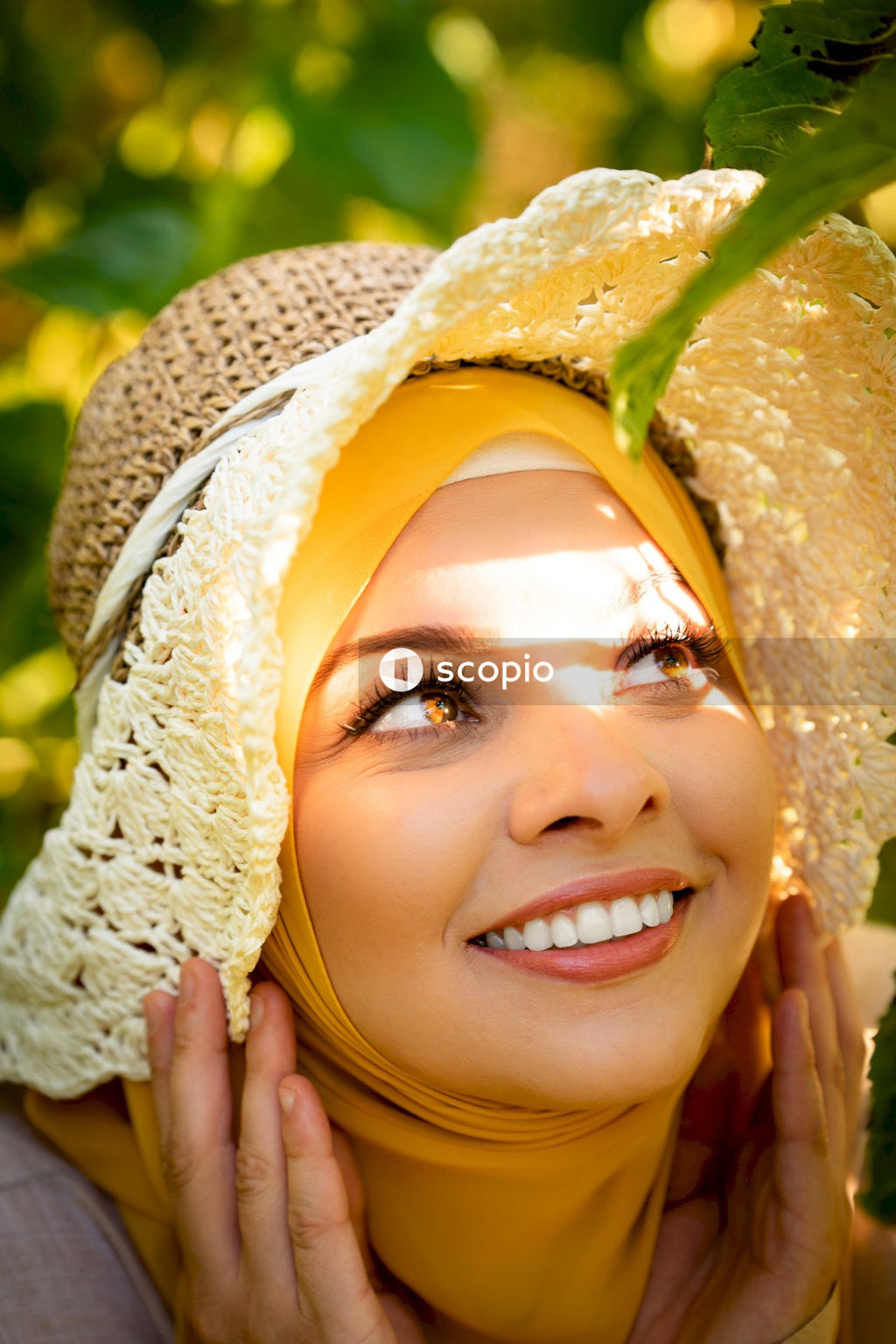 Woman in a hijab smiling