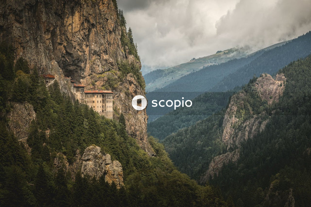 Brown concrete building on mountain