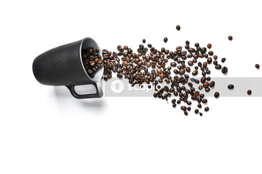 Black ceramic mug on white surface