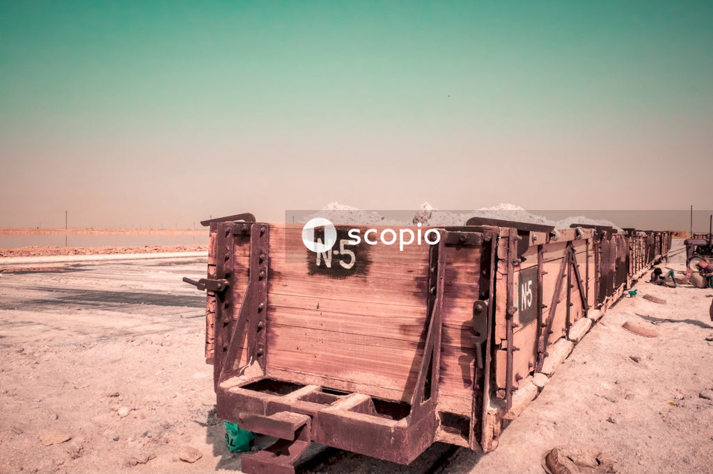 Brown wooden shed on beach
