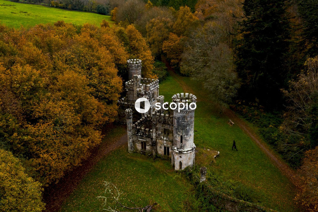 Aerial drone view of Ireland's Ballysaggartmore Towers . Medieval entrance in the forest, Lismore, County Waterford.
