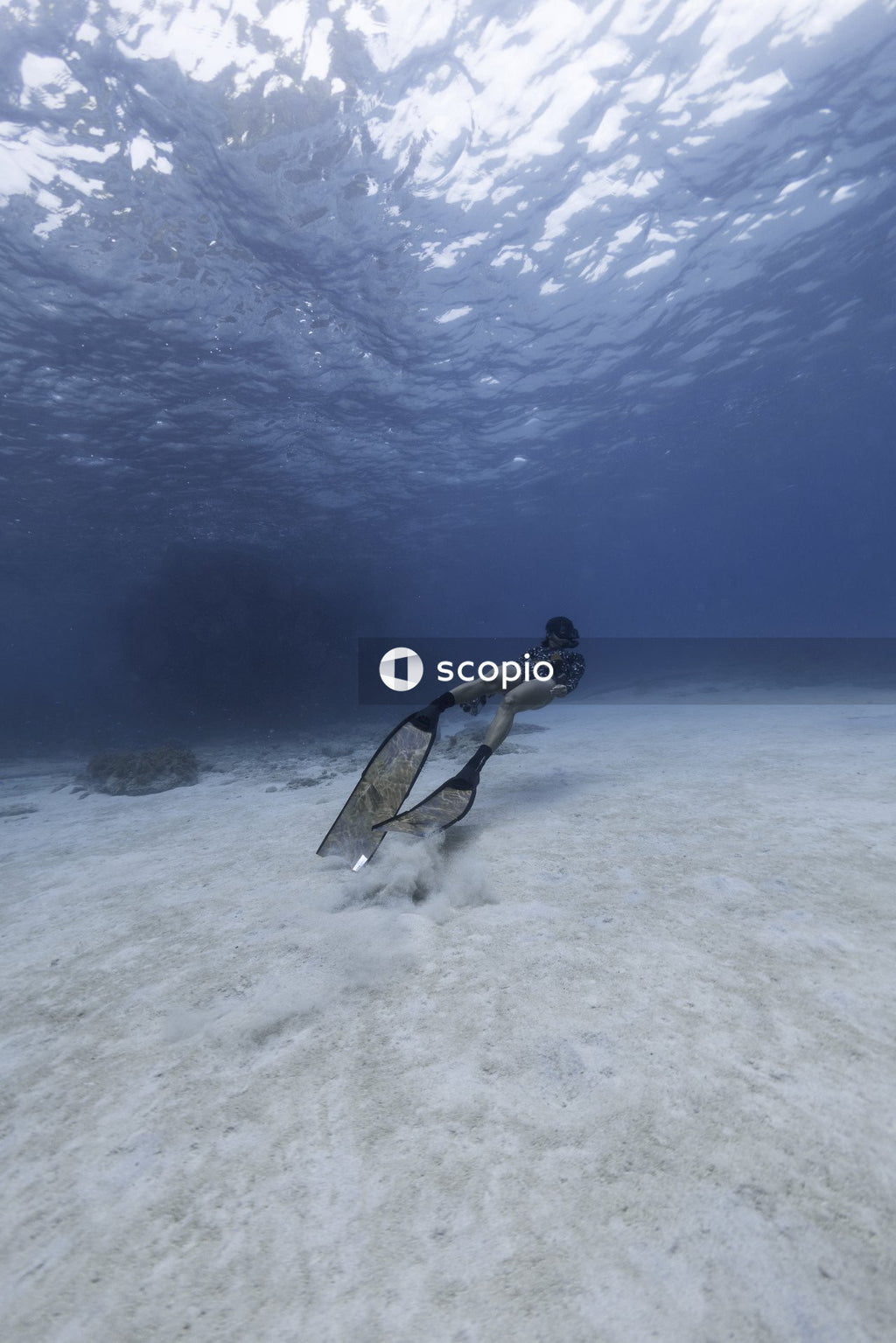 Woman swimming underwater