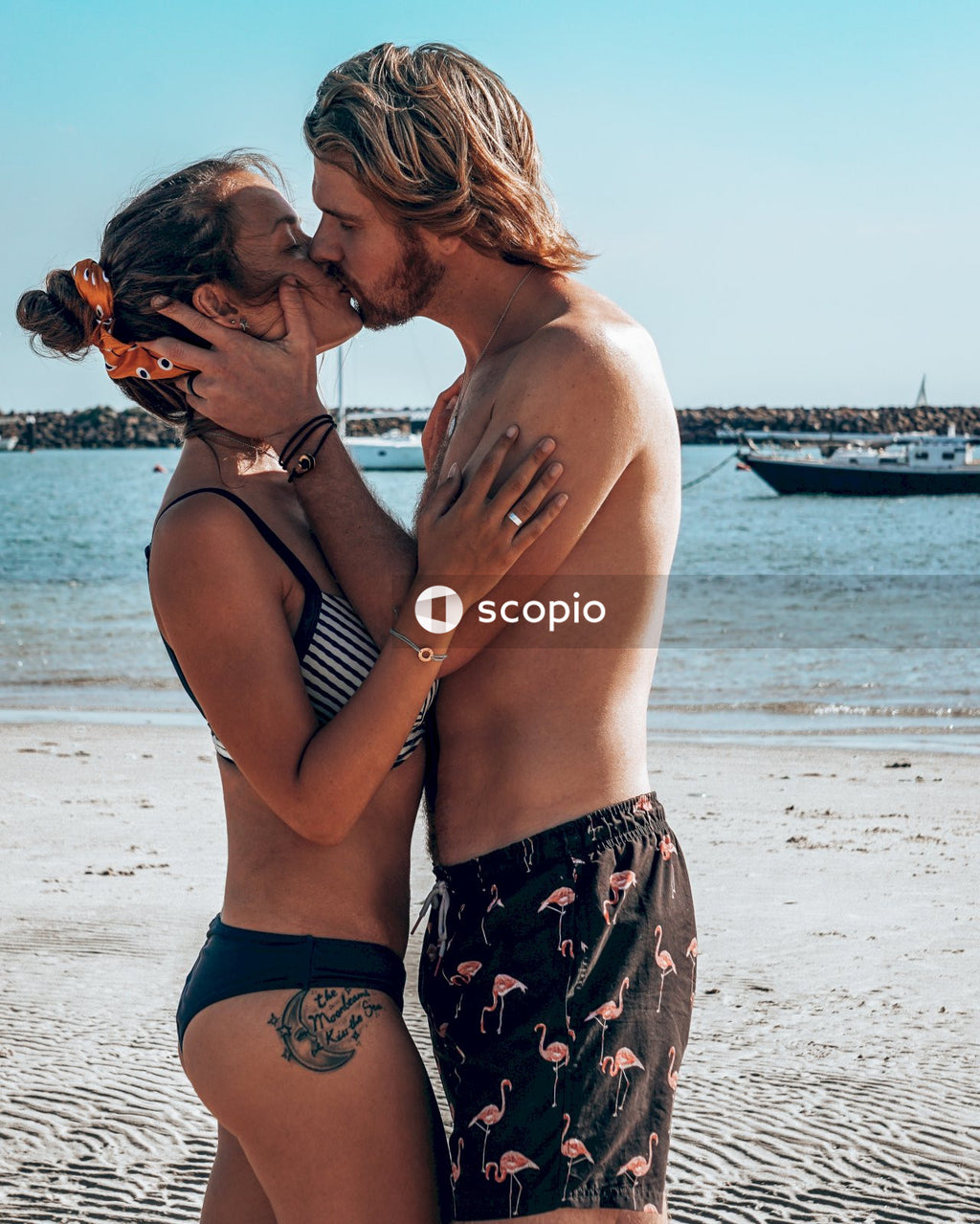 Young couple kissing on beach