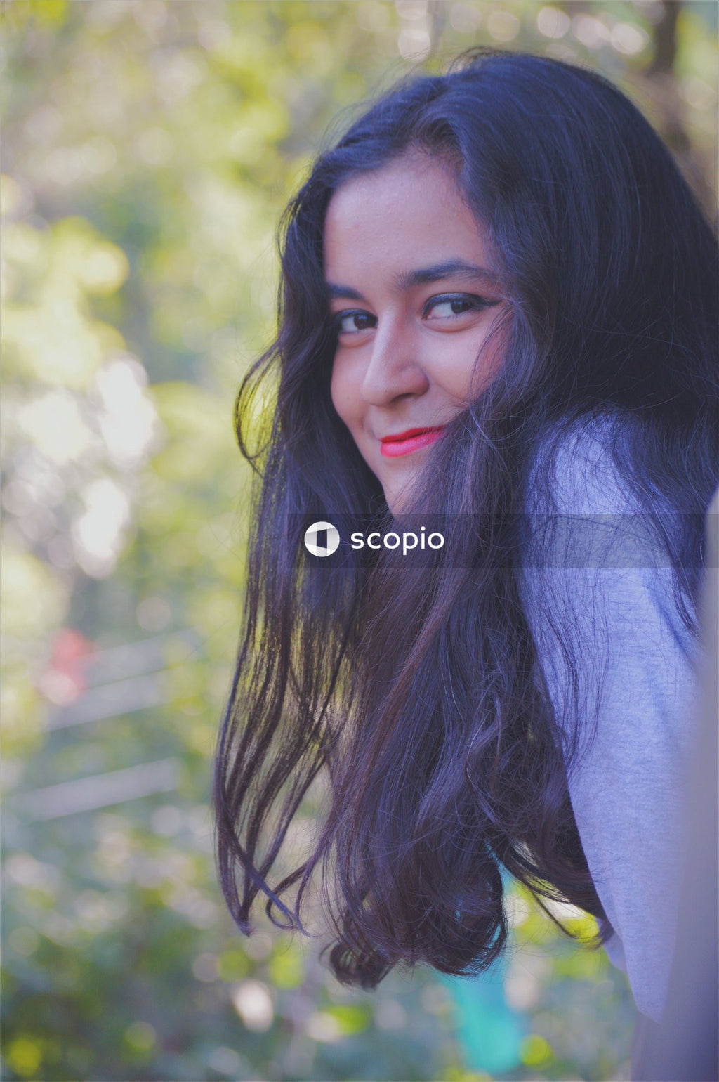 Woman with long hair smiling