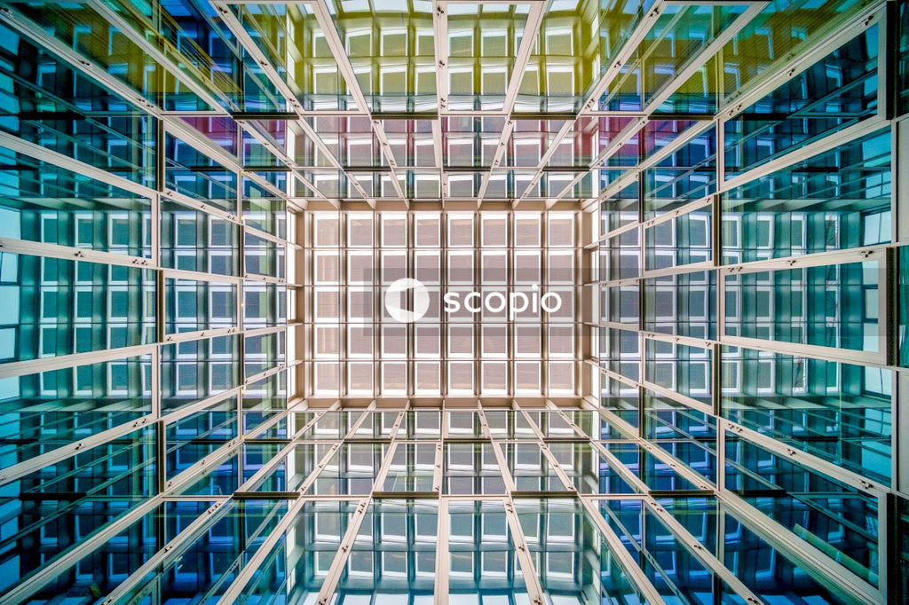 Interior shot and ground view of glass ceiling in a skyscraper
