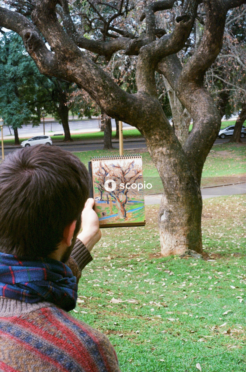 Boy holds painting