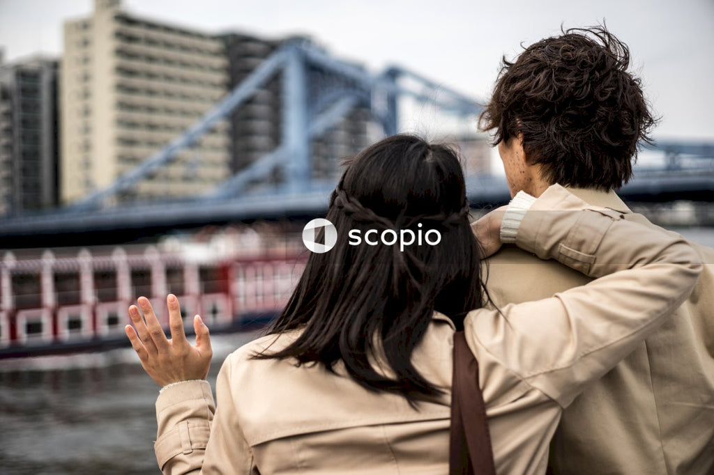 Back view of couple standing in the city