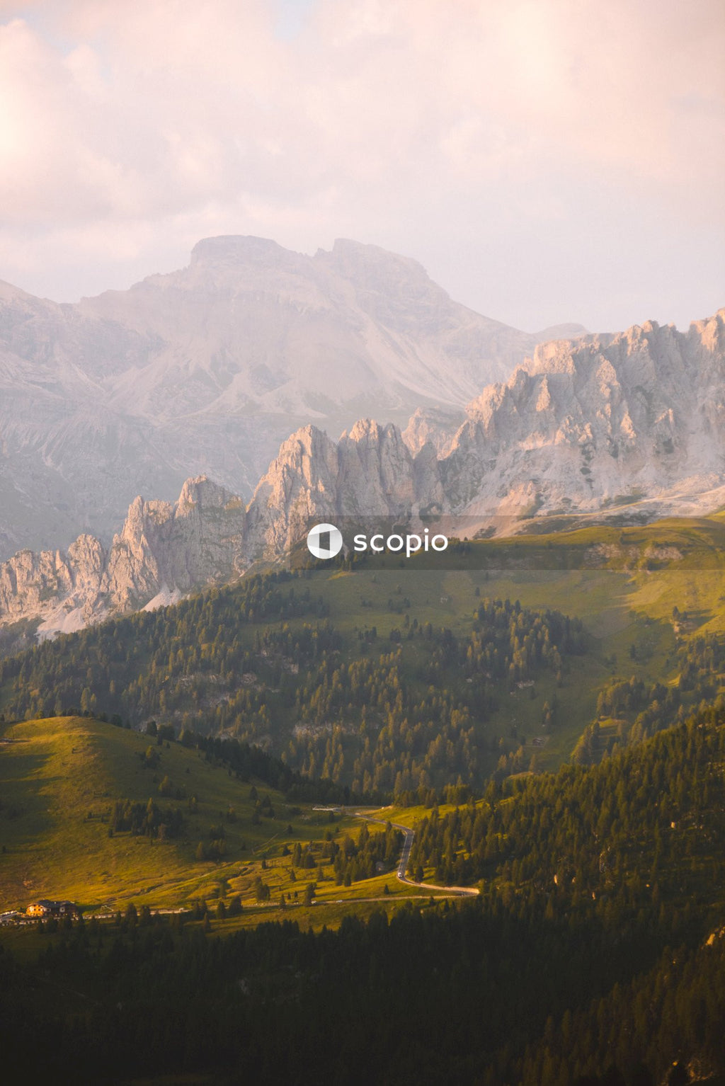 Green and brown mountains under white sky