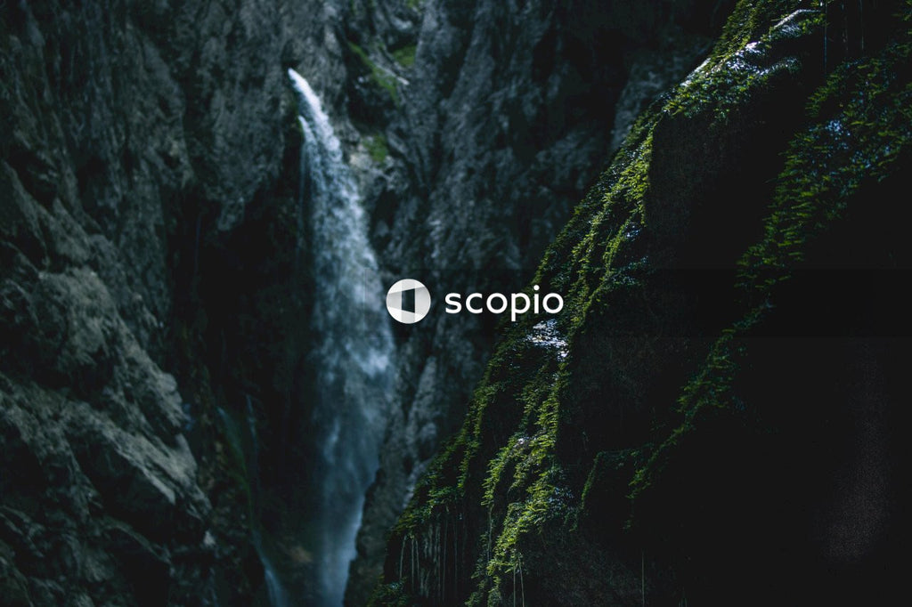 Mossy Canyon With Waterfall in Center
