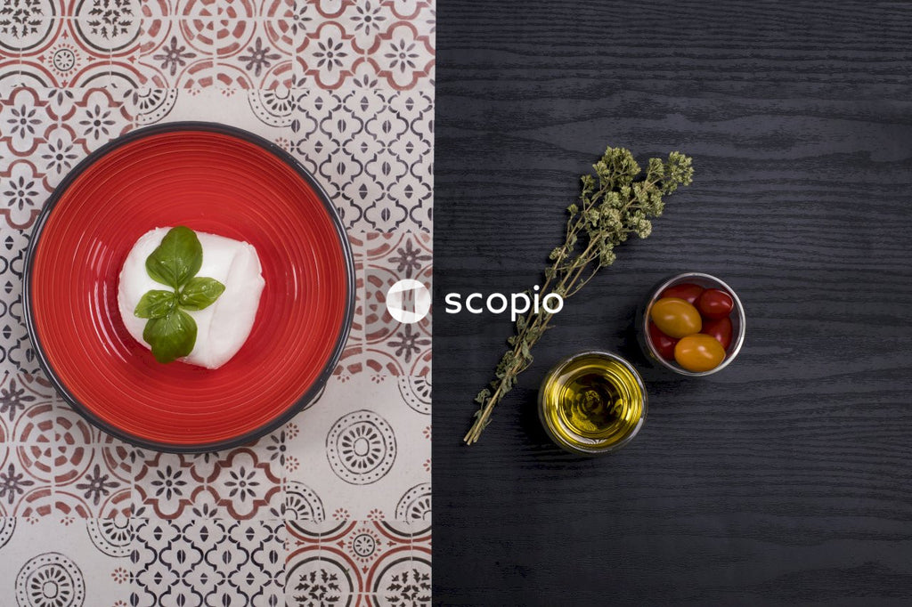 Stainless steel fork on red and white ceramic plate