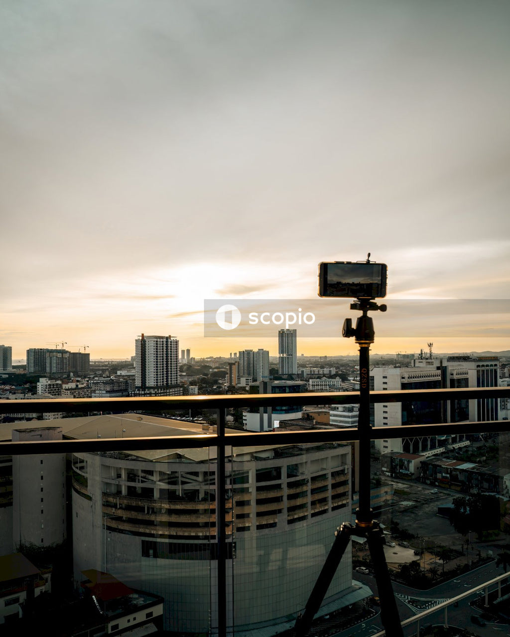 Black and gray telescope on top of building