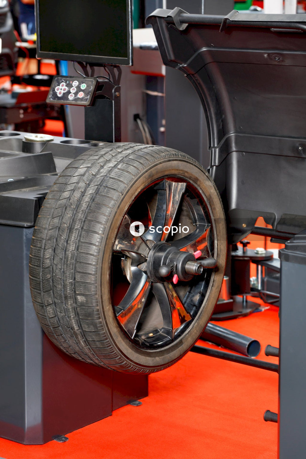 Black and red car wheel