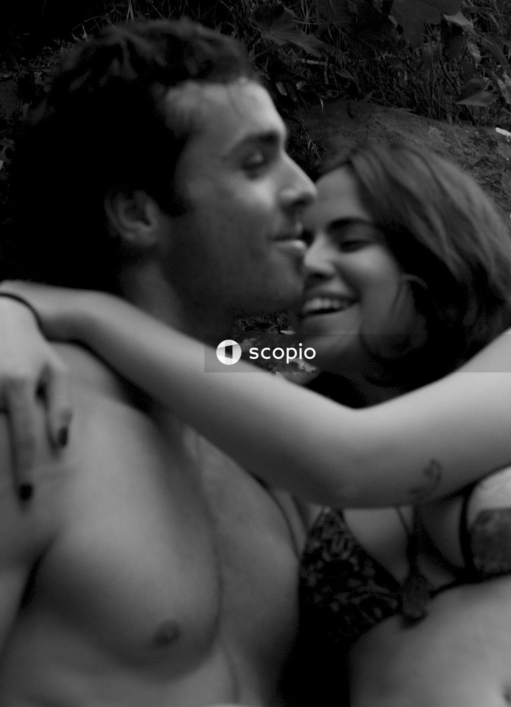Grayscale portrait of happy couple