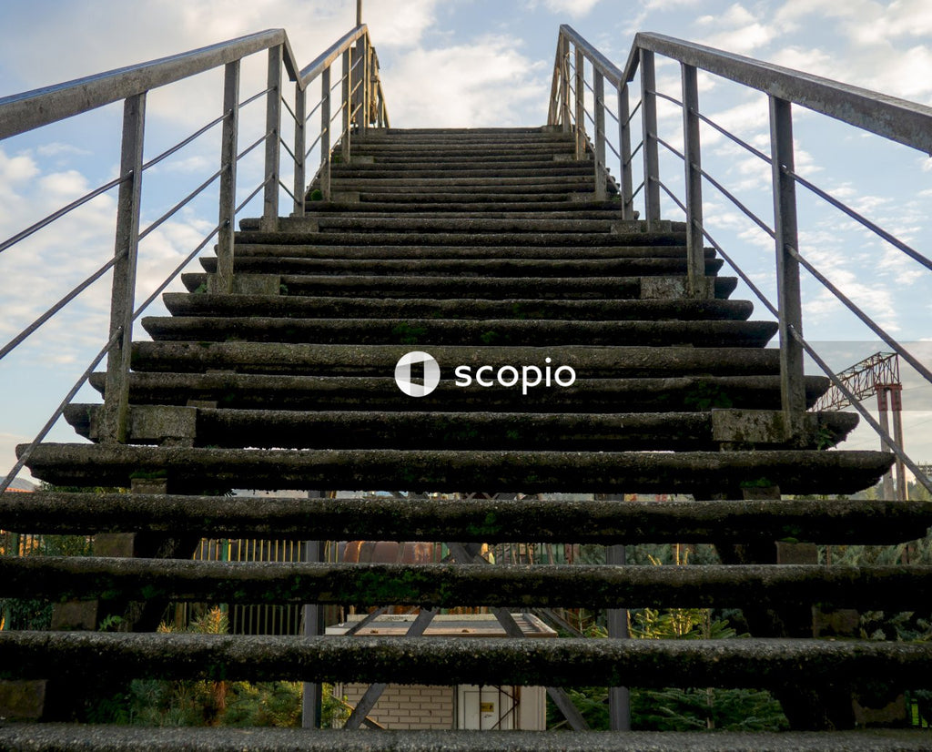 Black and white staircase under cloudy sky