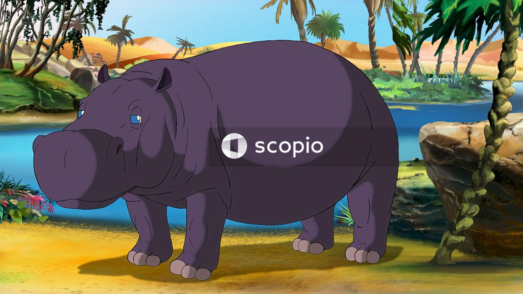 Black elephant statue on green grass field during sunset