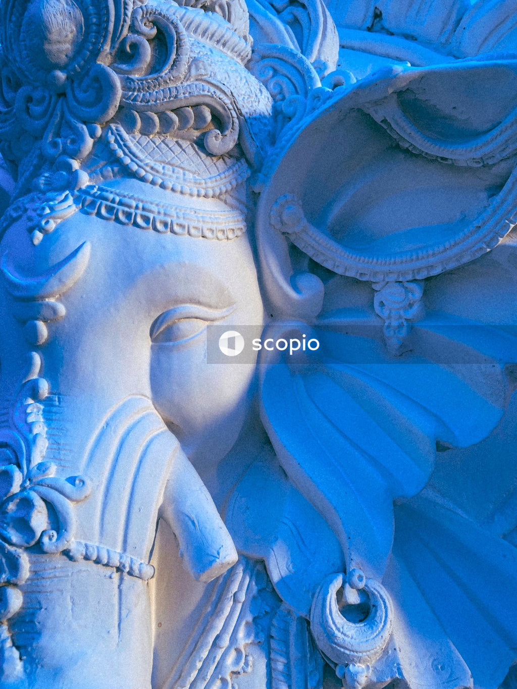 Blue and white angel figurine