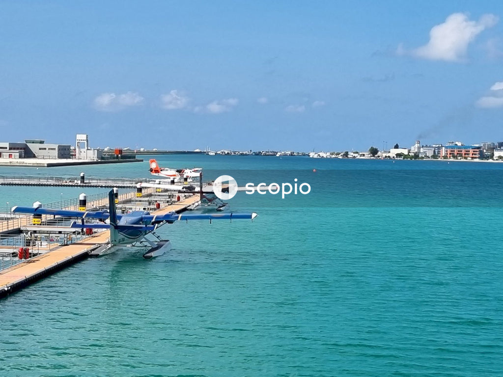 Blue and white boat on sea under blue sky