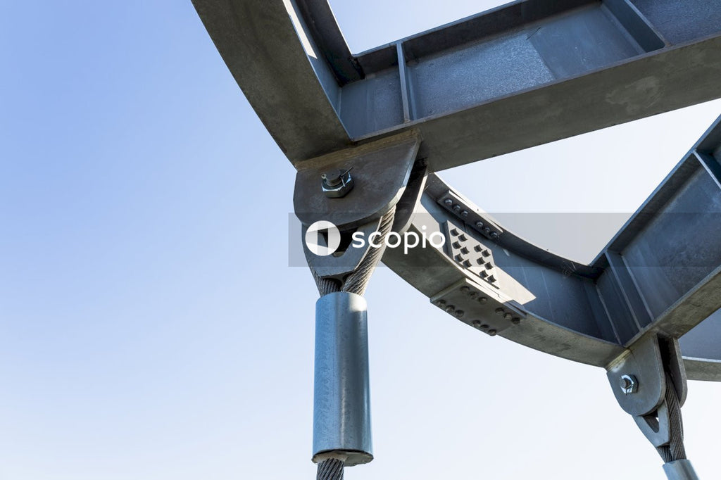 Blue metal stand under blue sky
