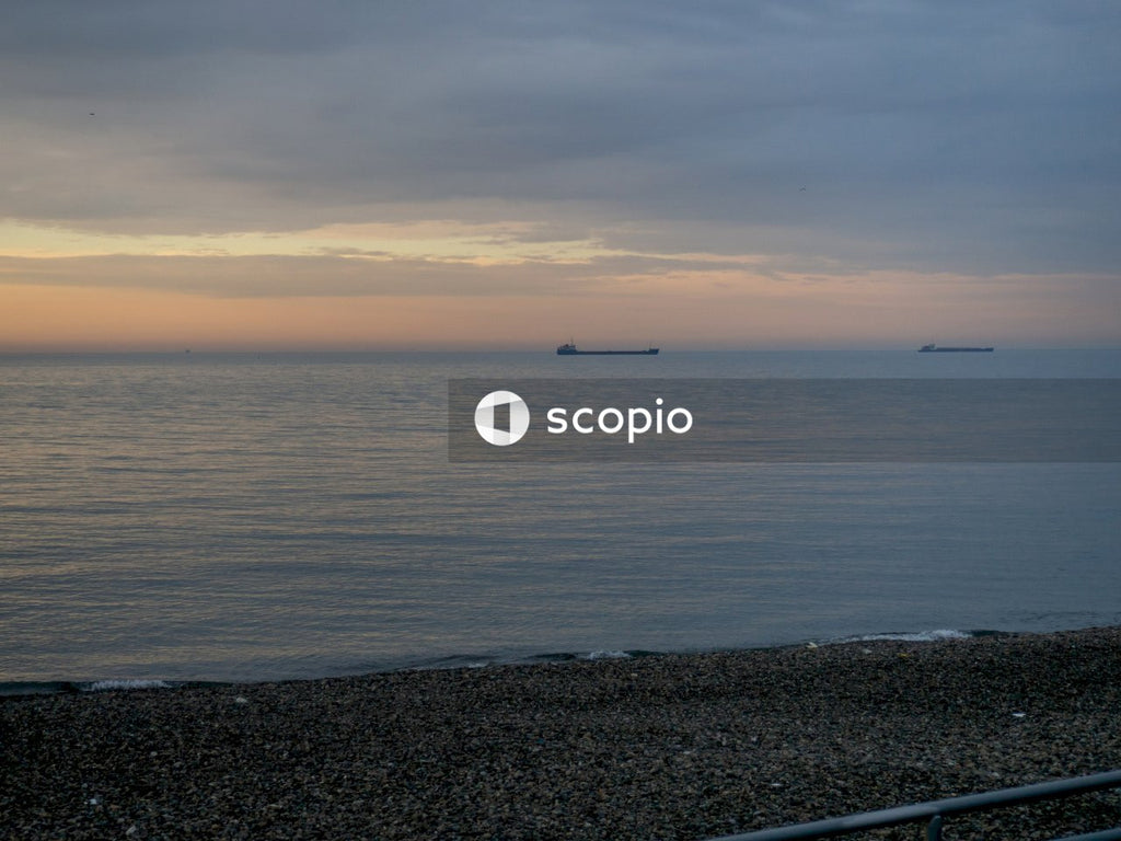 Body of water during sunset