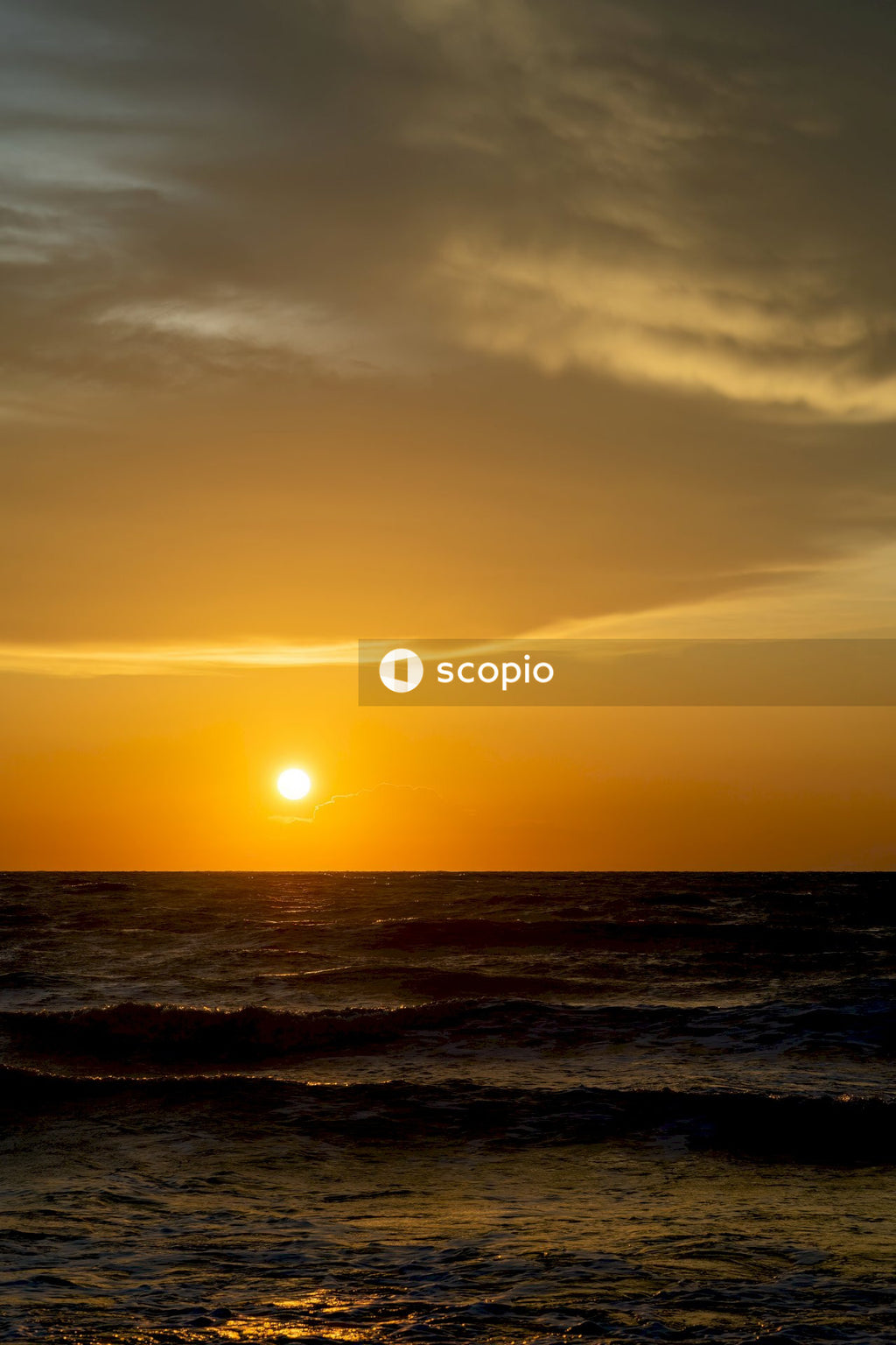 Body of water during sunset