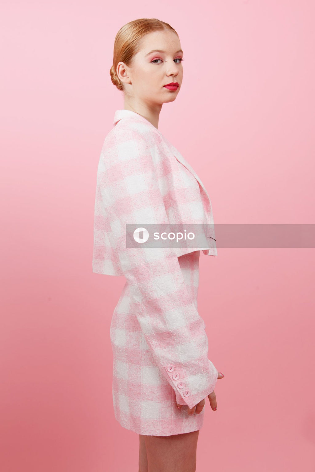 Boy in white and pink checkered dress shirt