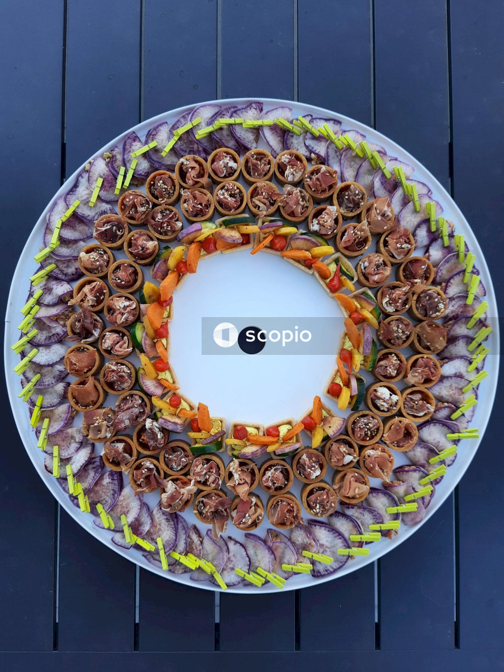 Brown and white donut on white ceramic plate