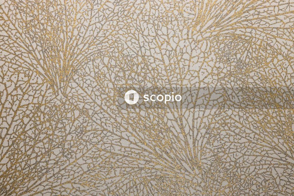 Brown and white floral textile
