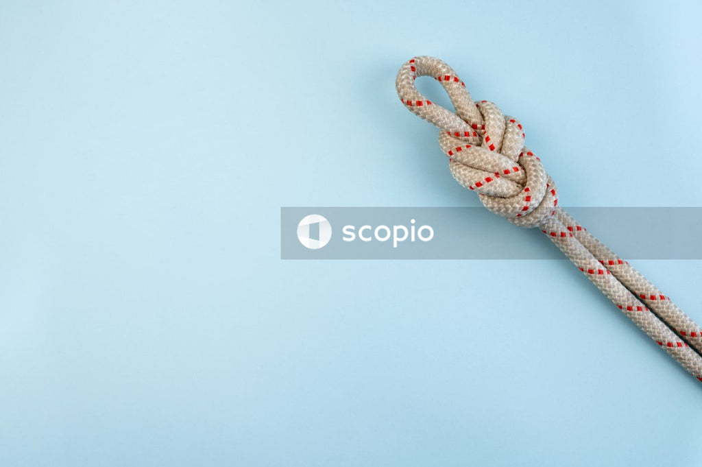 Brown and white rope on white surface