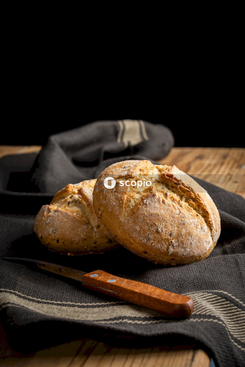 Brown bread on brown wooden table