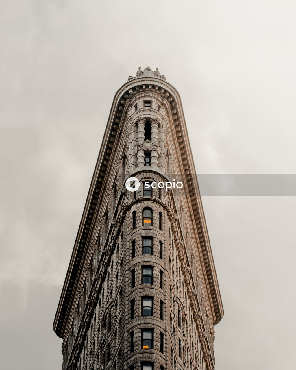 Brown concrete building under white sky