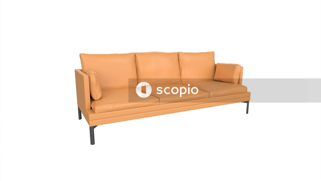 Brown couch with throw pillows