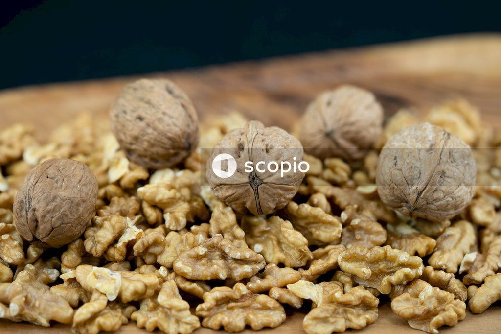 Brown nuts on brown wooden table