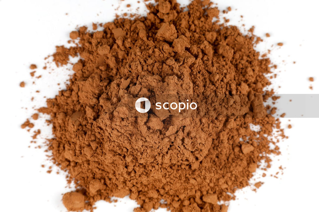 Brown powder in white ceramic bowl