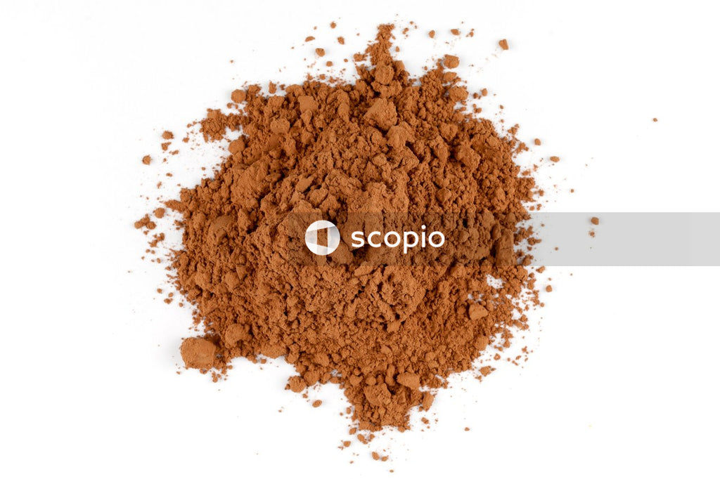 Brown powder on white surface