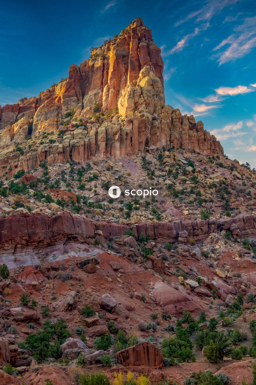 Brown rocky mountain under blue sky