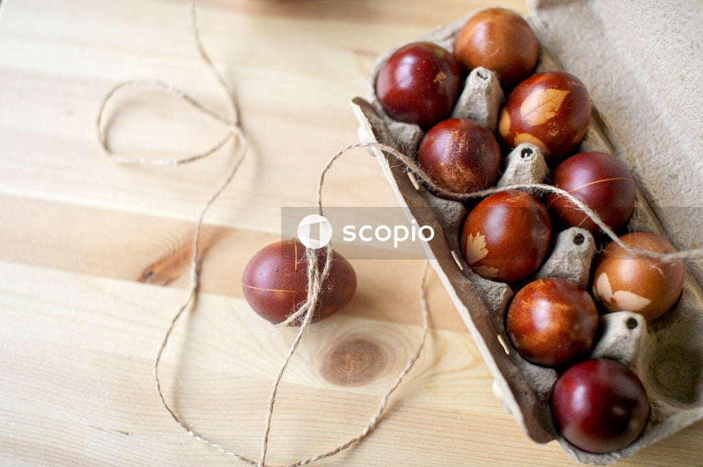 Brown round fruit on brown wooden table