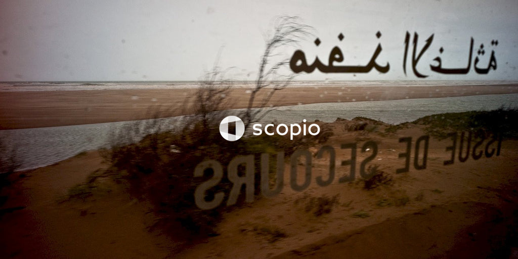 Brown sand near body of water