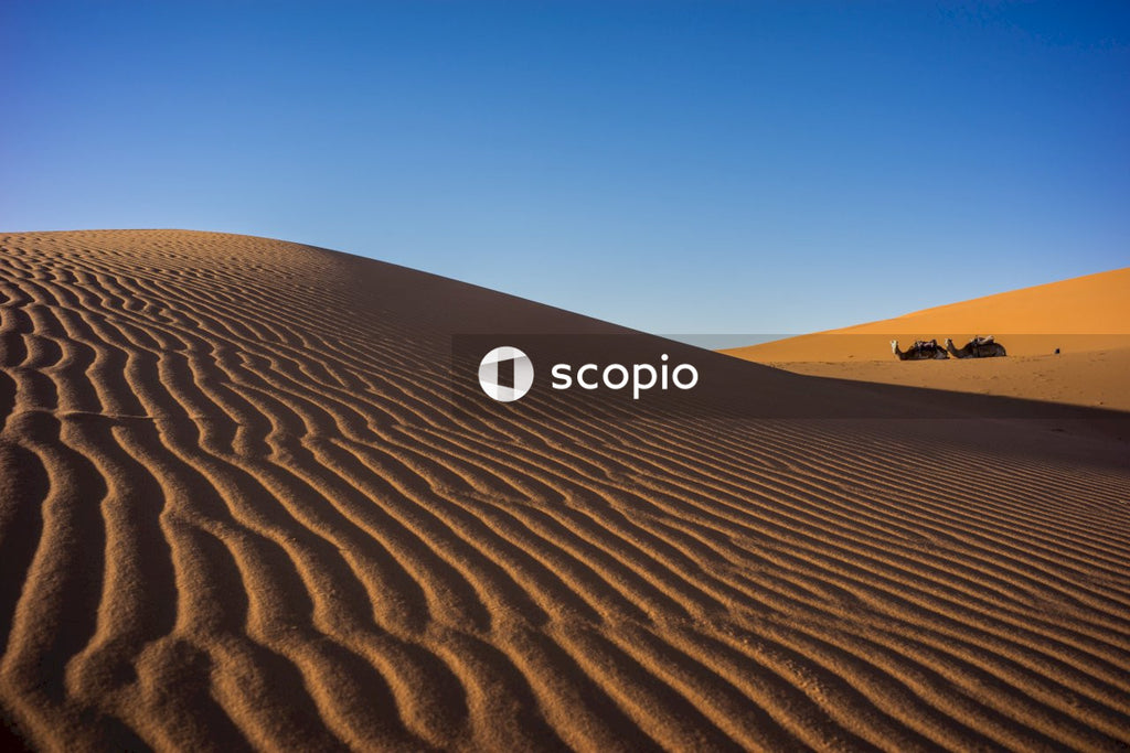 Brown sand under blue sky