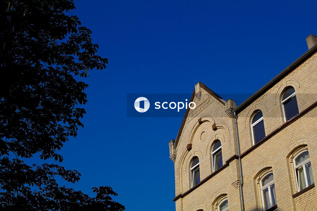 Brown concrete building under blue sky