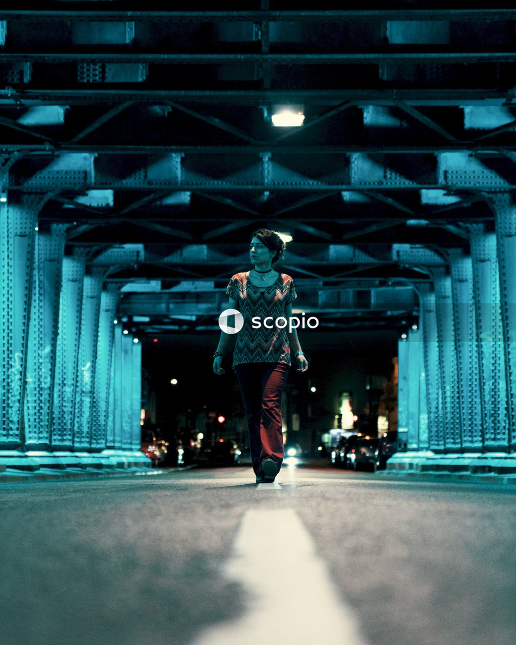 Woman walking in a tunnel