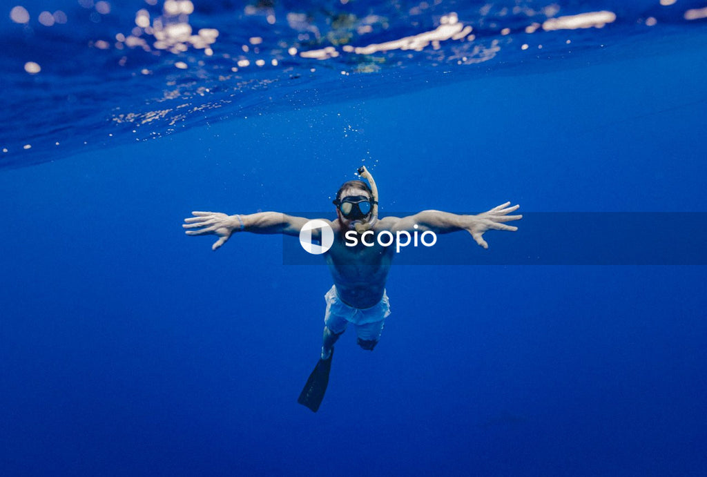 Underwater shot of man diving