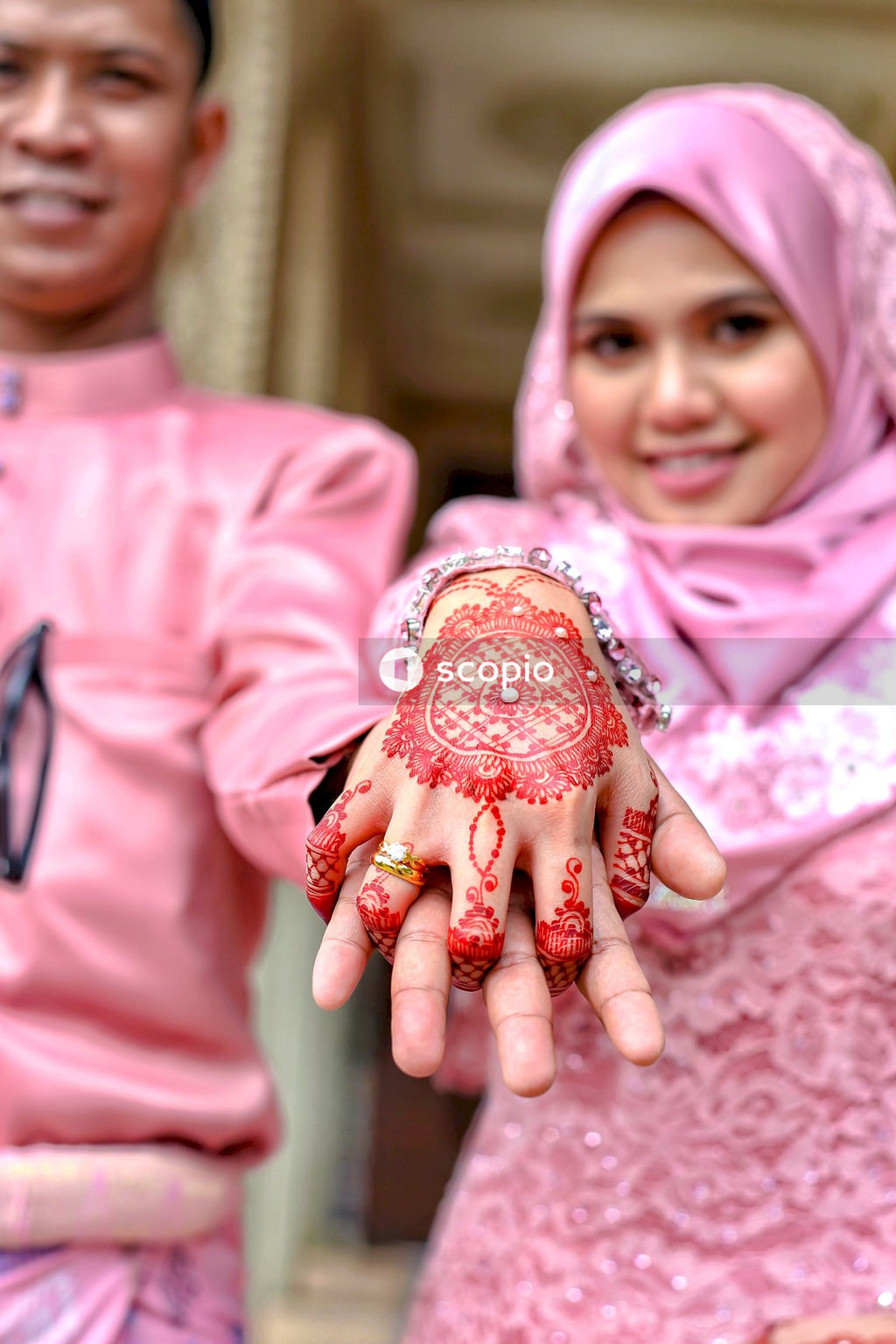 Couple holding hands