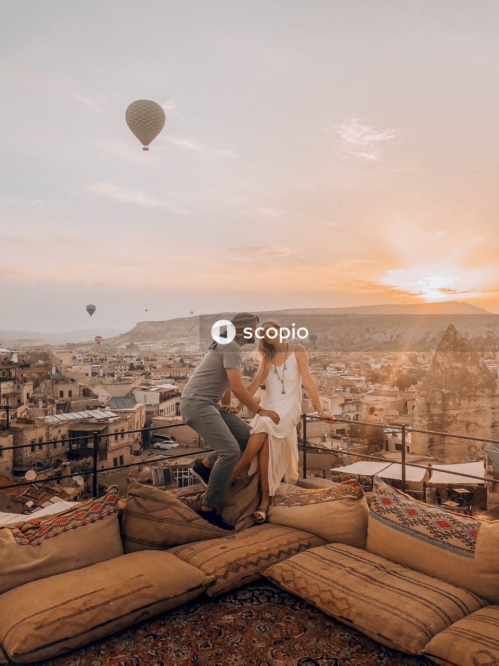 Couple standing on top of the building