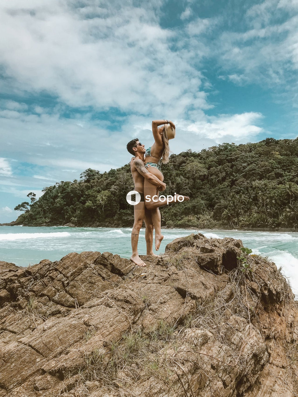 Man and woman hugging at the beach