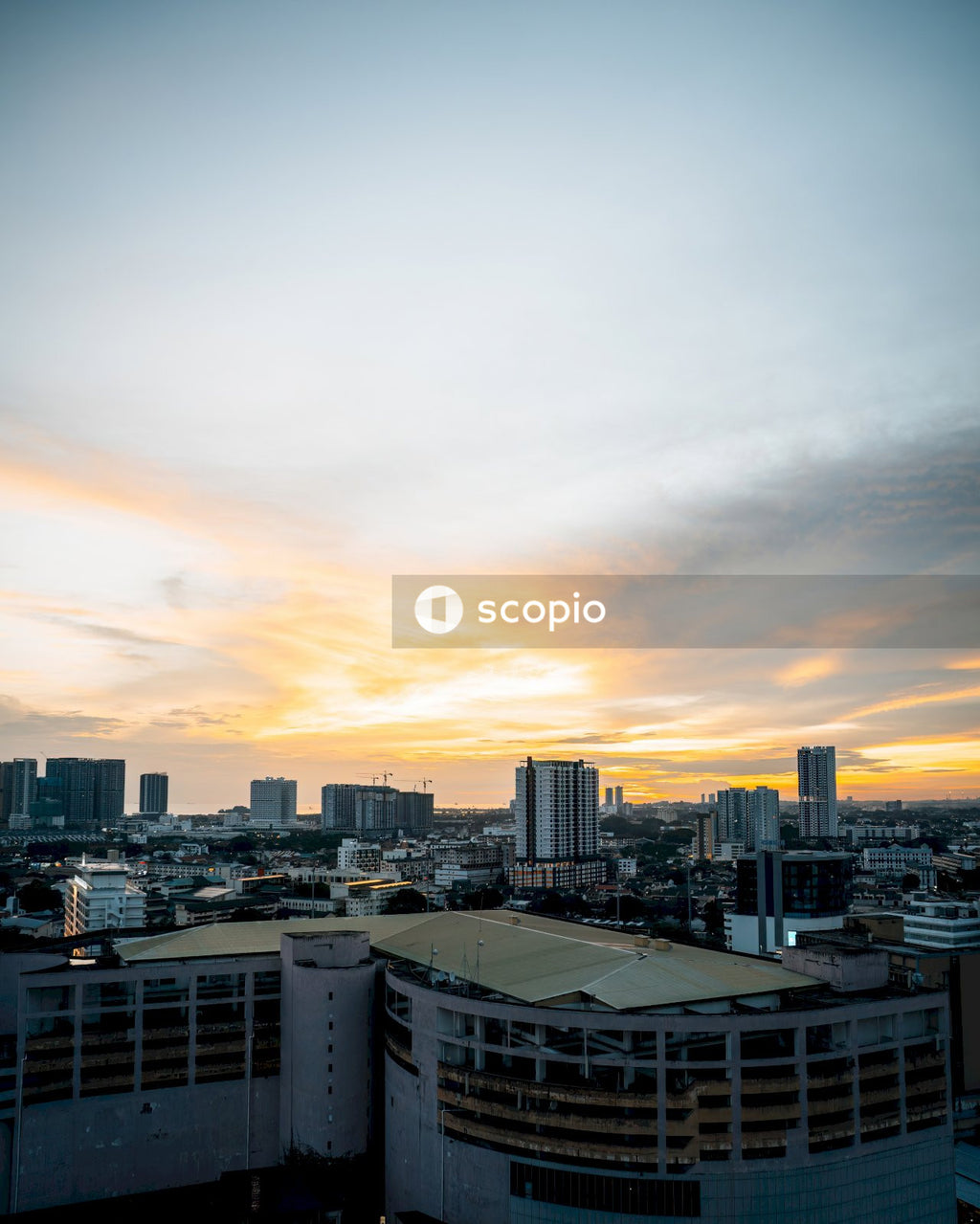 City skyline under cloudy sky